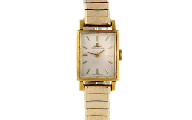 JAEGER-LECOULTRE - a lady's gold plated bracelet watch together with a lady's Omega wrist watch.