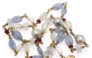 Josephine Bergsøe: A necklace set with numerous fancy-cut sapphires and kalcedones, ruby roundels and cultured pearls, mounted in 18k gold. L. 41 cm.