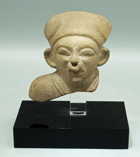 LaTolita bust depicting a figure in traditional headdress