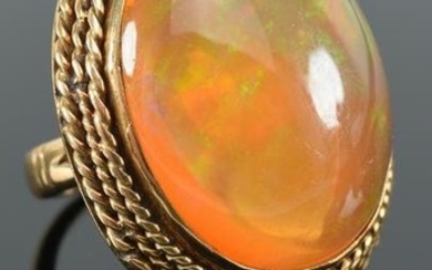 Large Jelly opal and gold ring. Oval cabochon cut