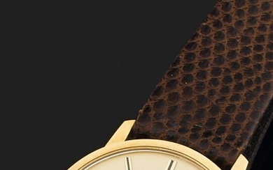 Montre bracelet d'homme, la montre de forme ronde en or jaune 750 millièmes, cadran émaillé...