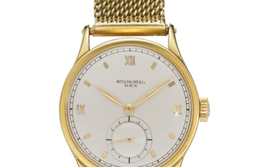 PATEK PHILIPPE, REF. 570, CALATRAVA, A FINE 18K YELLOW GOLD WRISTWATCH WITH SUBSIDIARY SECONDS ON GAY FRERES BRACELET