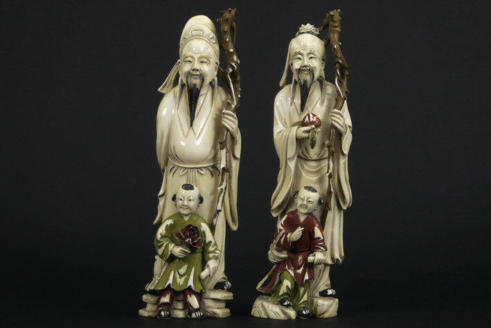 Pair of antique Chinese sculptures in partly polychromed...