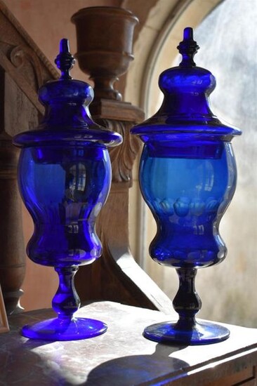 Pair of blue tinted glass covered pots, Italy...