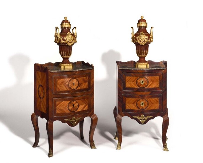 Pair of rosewood and violet wood bedside tables opening with three drawers, resting on arched legs, grey marble top with scalloped edge. (accidents and missing parts, including two lock entries). Italy, mid 18th century. H : 77 cm, W : 47 cm, D : 34 cm