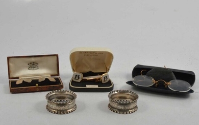 Pair of silver cufflinks, pair of silver napkin rings, and other small silver and plated items.