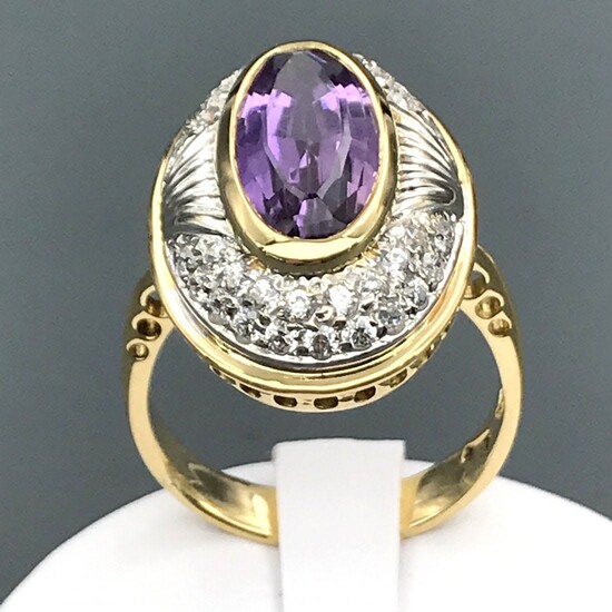 Ring with cubic zirconia and amethyst in 18 kt