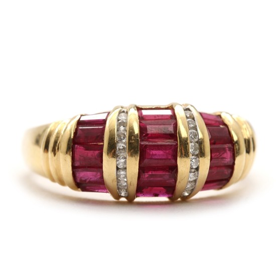 Ruby and diamond ring set with numerous baguette-cut rubies and brilliant-cut diamonds, mounted in 18k gold. Size 58. Weight app. 5.5 g. 2009.