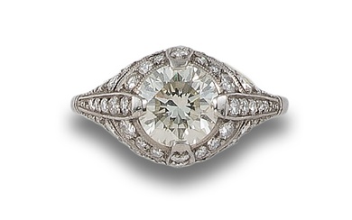SOLITAIRE RING, OLD STYLE, WITH DIAMONDS, IN PLATINUM