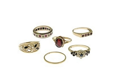 Six gold and gem set rings, including a diamond and sapphire...