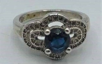 Sterling Silver Ring with CZs Blue Center Stone