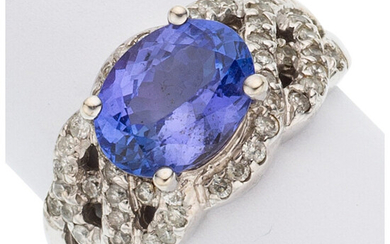 Tanzanite, Diamond, White Gold Ring The ring features an...
