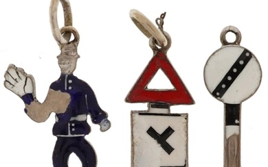 Three 18ct white gold and enamel charms in the form of a pol...