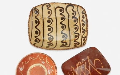 Three redware and slip-decorated glazed earthenware