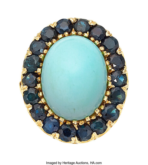 Turquoise, Sapphire, Gold Ring The ring features an oval-shaped...