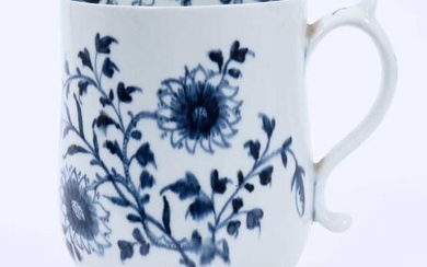 Two Lowestoft bell mugs, the first painted in blue with two flowering stems, a smaller sprig and a moth to the reverse, painted border inside, painter's number 5 inside footrim, 14cm high, and the...