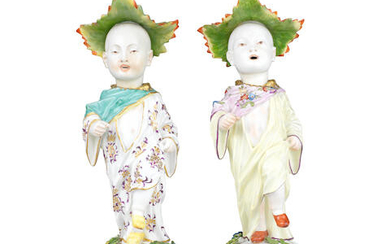 Two gilt-metal-mounted figures of nodding Chinese marching boys, circa 1750