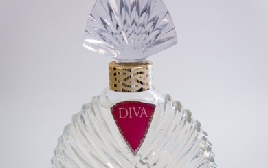 Ungaro - "Diva" - (1983) Imposant flacon publicitaire décoratif (liquide factice) en verre massif incolore...