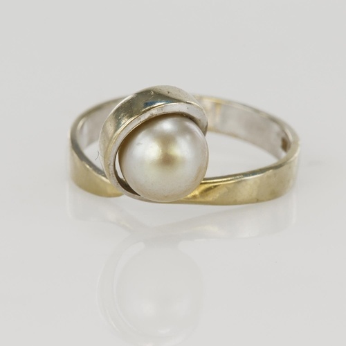 White gold (tests 14ct) cultured pearl dress ring, one pearl...