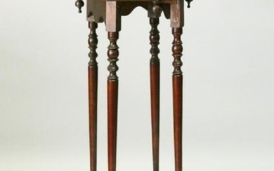 A TWO-TIER MAHOGANY JARDINIERE STAND. 33cms diameter x