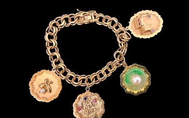 14K Yellow Gold Charm Bracelet with 4 Suspended Charms.