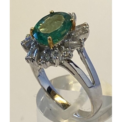 18 carat White Gold Colombian Emerald and Diamond Ring. The...