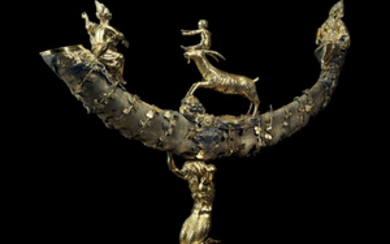 CENTRAL EUROPEAN, PROBABLY AUSTRIAN, SECOND HALF 17TH CENTURY AND LATER, A SILVER-GILT MOUNTED IBEX HORN TROPHY