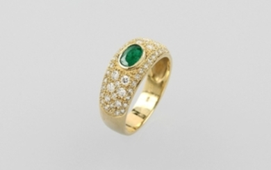 18 kt gold ring with emerald and...