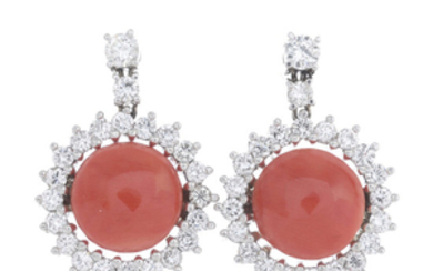 A pair of coral and diamond cluster earrings.
