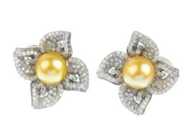 A pair of diamond and cultured pearl floral earrings. View more details