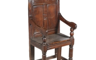 An English oak panel back armchair, circa 1660