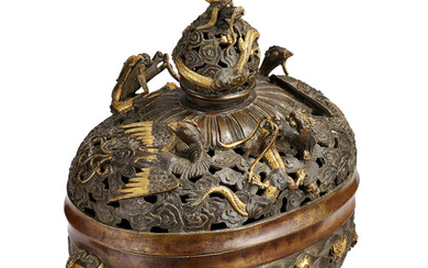 A fine parcel-gilt bronze 'dragon and phoenix' incense burner and cover