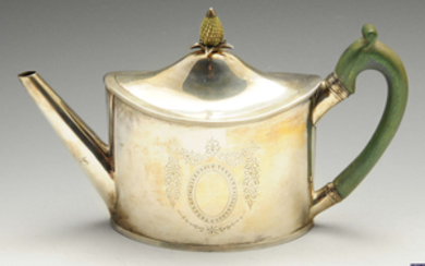 A George III silver teapot by Peter & Ann Bateman.