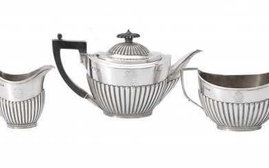 A late Victorian silver oval tea service by The Goldsmiths & Silversmiths Co. Ltd