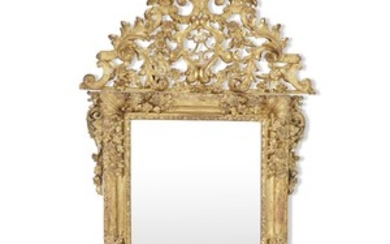 A Louis XIV carved giltwood mirror circa 1700 The...
