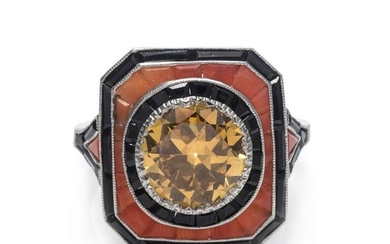A Platinum, Fancy Colored Diamond, Coral and Onyx Ring