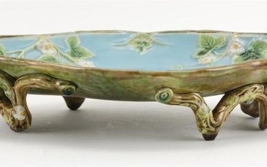 GEORGE JONES MAJOLICA DISH Quatrefoil, with strawberry blossoms against a turquoise-colored ground. Faux bois handles and feet. Impr...