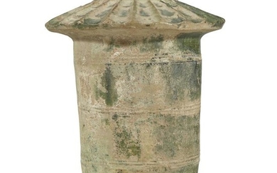 A Chinese green-glazed pottery "Granary" jar, Han