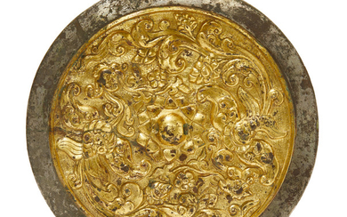 A rare gold overlay silvered bronze mirror