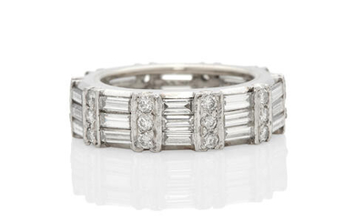 A 14K WHITE GOLD AND DIAMOND ETERNITY BAND