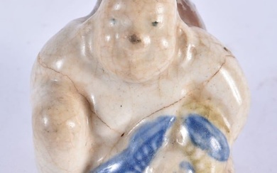 A 17TH/18TH CENTURY JAPANESE KOREAN BLUE AND WHITE POTTERY BRUSH WASHER formed as a seated male hold