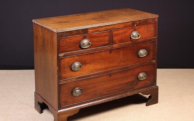 A 19th Century Mahogany Chest of Drawers. The two short over two long cock-beaded drawers with repla
