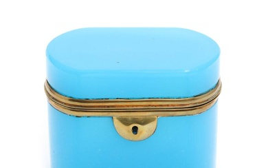 A 19th century Bohemian turquoise glass box with brass mounting. H. 9.3....