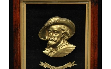 A 19th century gilt metal applique, cast as a titled portrai...