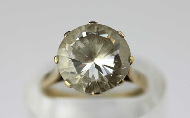 A 9ct gold and colourless gem set solitaire ring