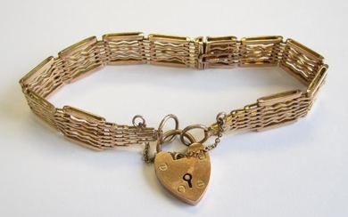 A 9ct gold gatelink Bracelet with padlock charm, approx...