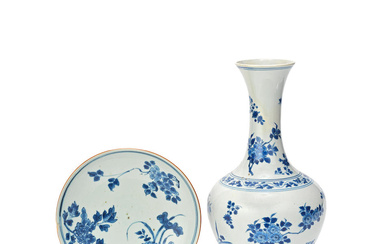 A BLUE AND WHITE FLORAL VASE AND A FLORAL DISH...