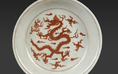 A CHINESE IRON-RED-DECORATED 'DRAGON' DISH, MING