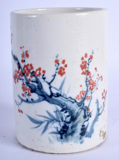 A CHINESE PORCELAIN BRUSH POT, decorated with foliage.