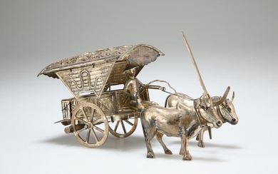 A CONTINENTAL SILVER MODEL OF A CHINESE MAN, OXEN AND